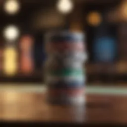 A close-up of a poker chip stack on a bar table.